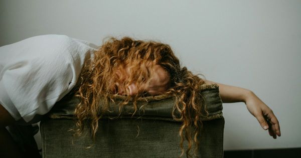 Exhausted mum carrying the mental load